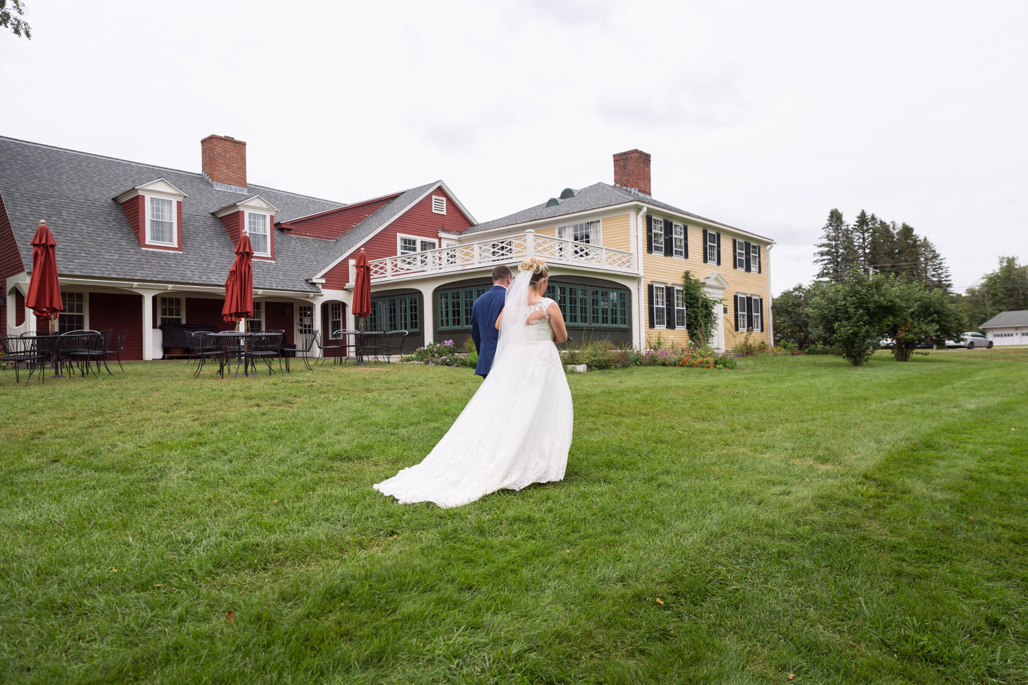 Bride and groom walking away after ceremony.