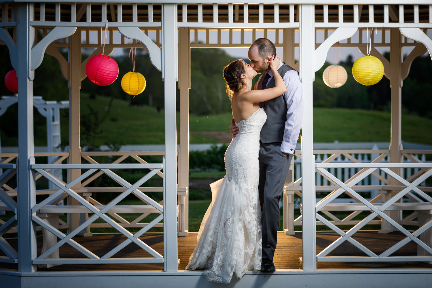 Couple Kissing at Salem Cross Inn Gazebo decorated with Chinese lantern