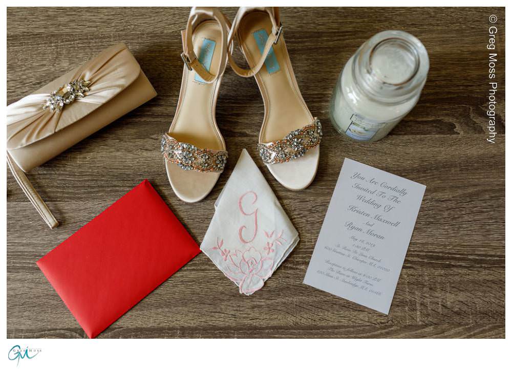 Brides details, shoes, invitation, earrings, handbag