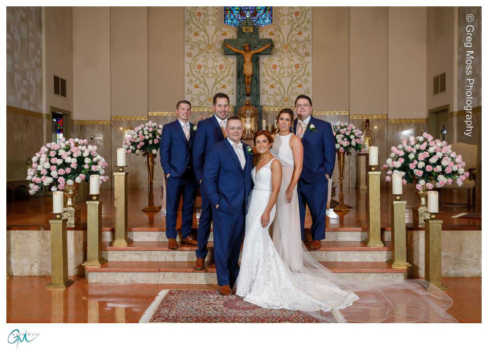 Bridal party on alter