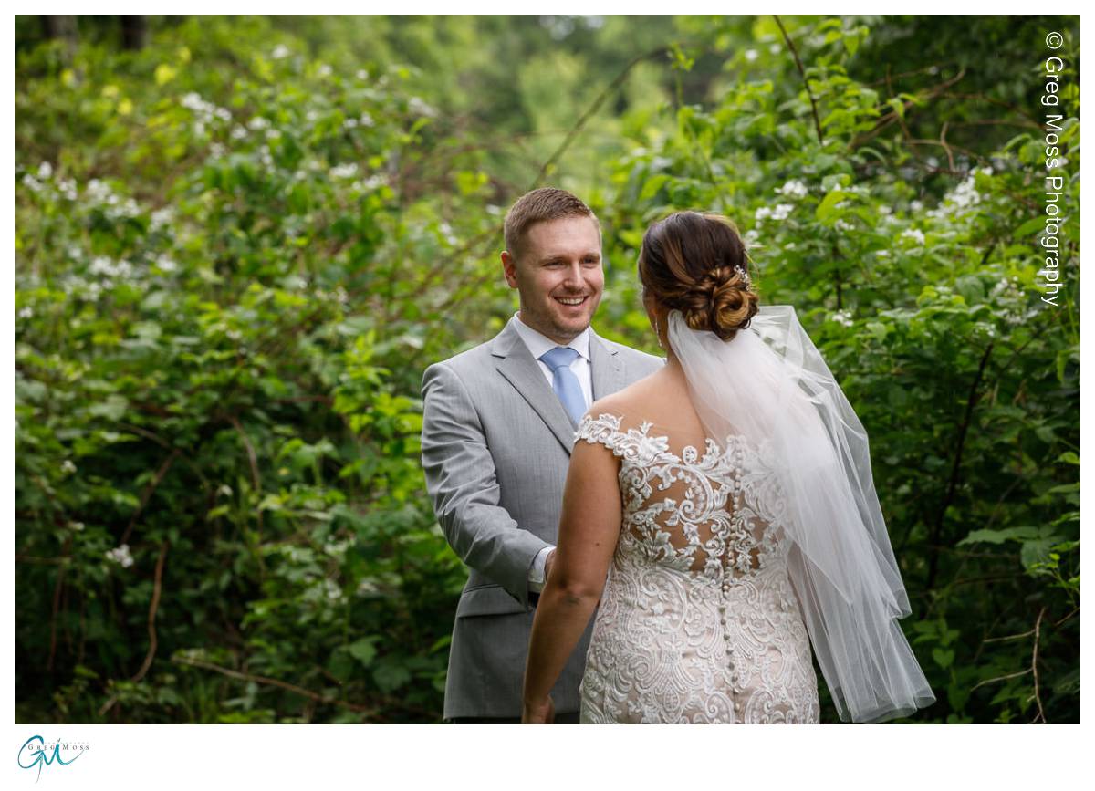 Red Barn Wedding0534 Bride and Groom first look surrounded by trees