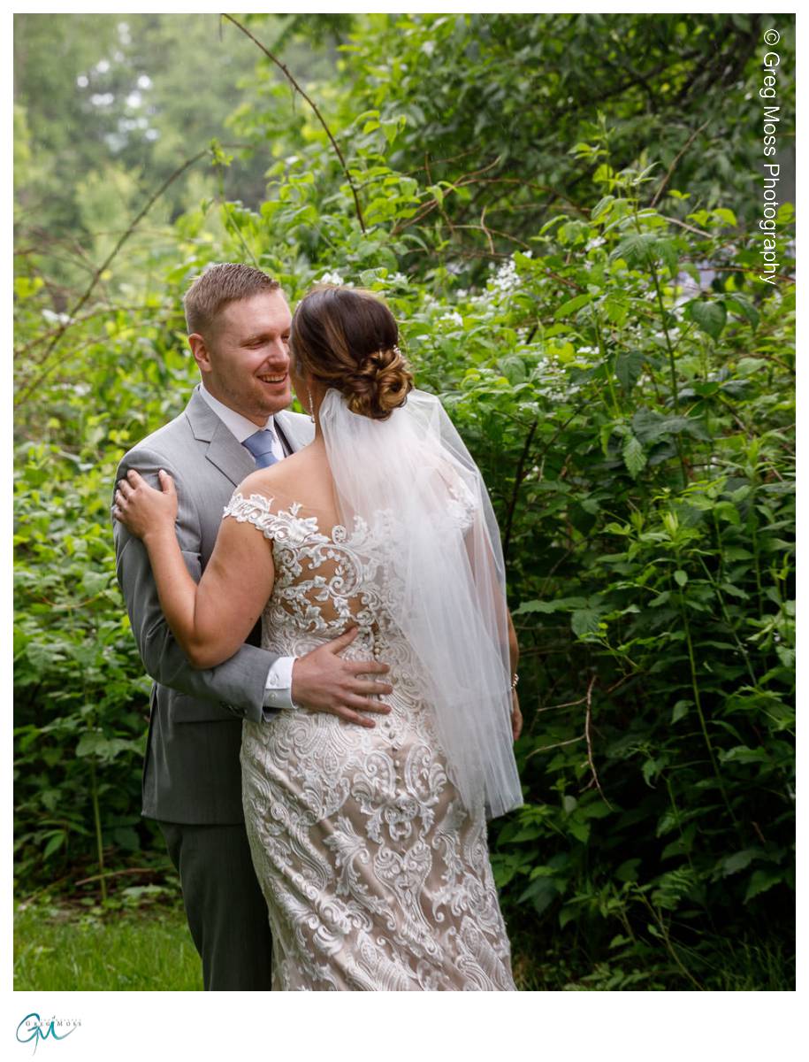 Red Barn Wedding0535 Bride and groom first look hugging each other