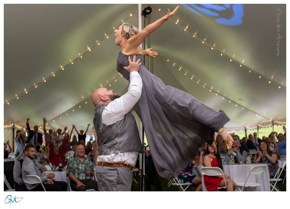 groomsmen and bridesmaid in dirty dancing signature move