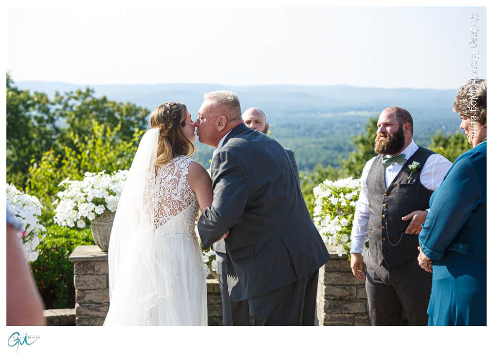 Log Cabin Wedding Photographer-10 Father kissing bride as he gives her away at alter