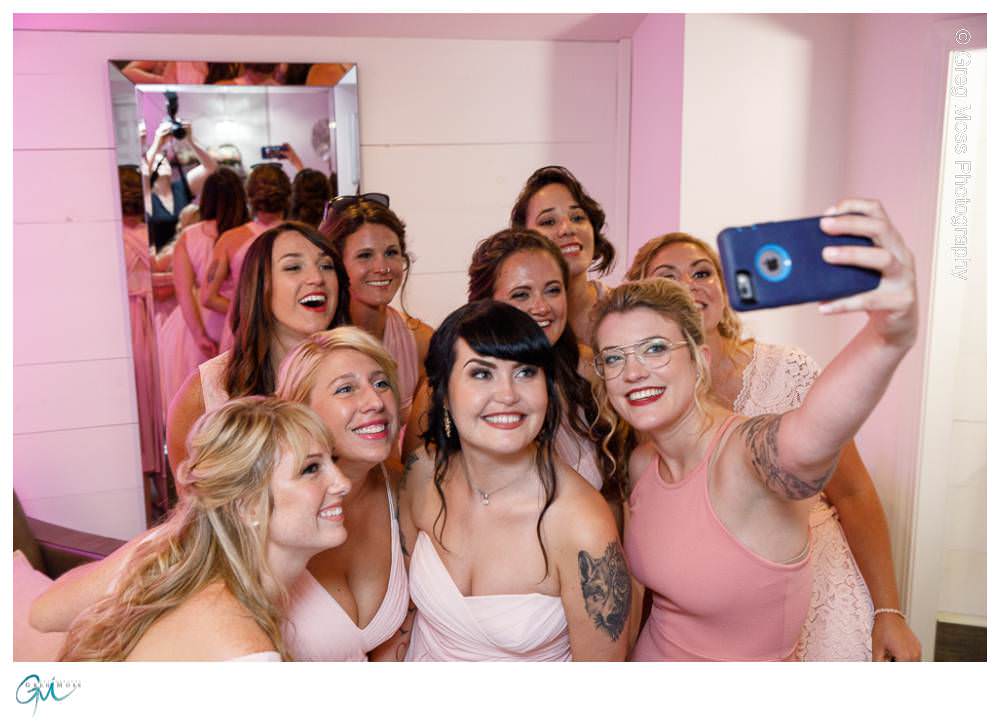 Log Cabin Wedding Photographer-6 Bridesmaids taking selfie in getting ready room