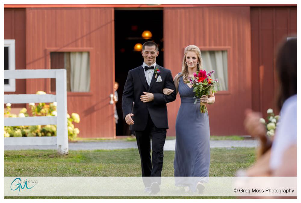 Best man and Maid of Honor walking down the aisle