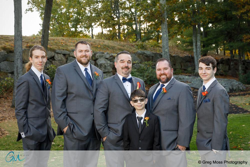 Groom and groomsmen outside at fall wedding
