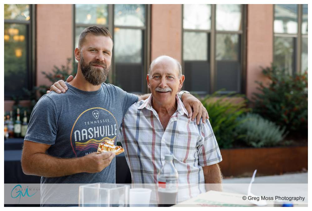 The Boylston Rooms Wedding-2 Groom with father enjoying pizza before they get ready for the wedding.