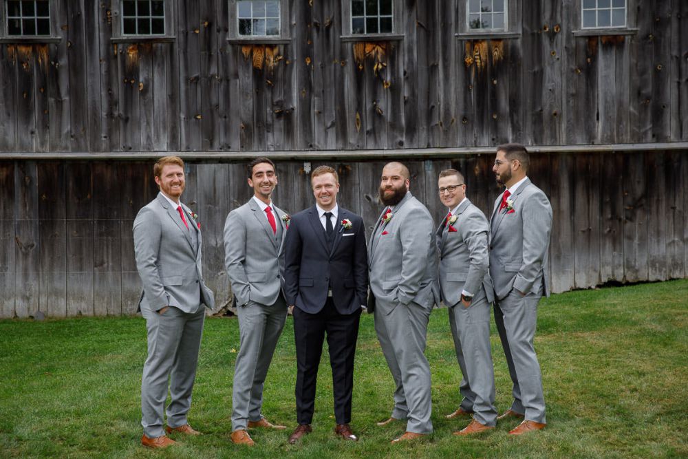 Wrights Mill Farm Wedding-12 Groom and Groomsmen with rustic barn in background