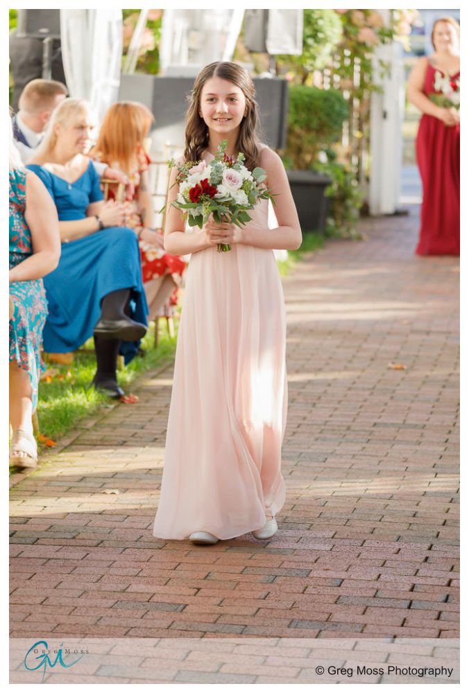 The Commons 1854-14 Flower girl walking down the aisle