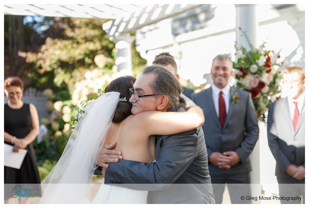 The Commons 1854-15 Father of the bride and Bride hugging at Alter