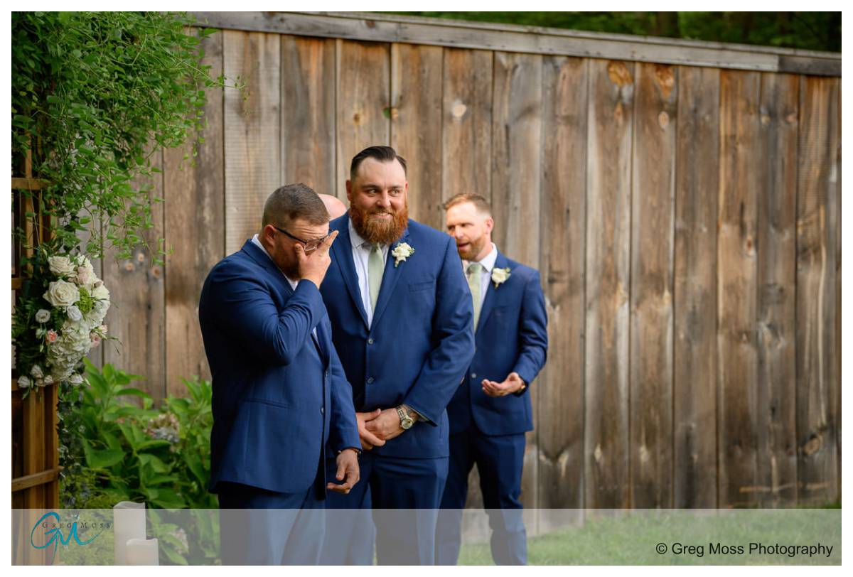 Blissful Meadows G. C. Wedding006 Groom at alter first look of bride