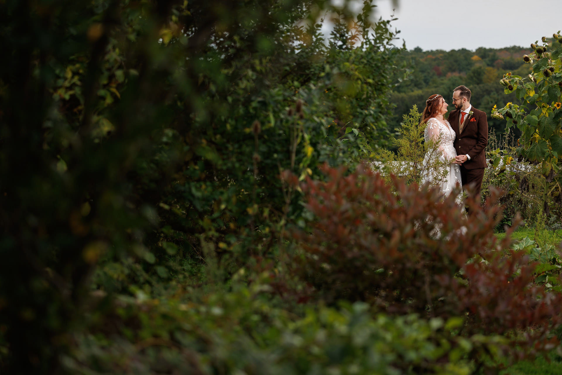 Salem Cross inn garden with wedding couple